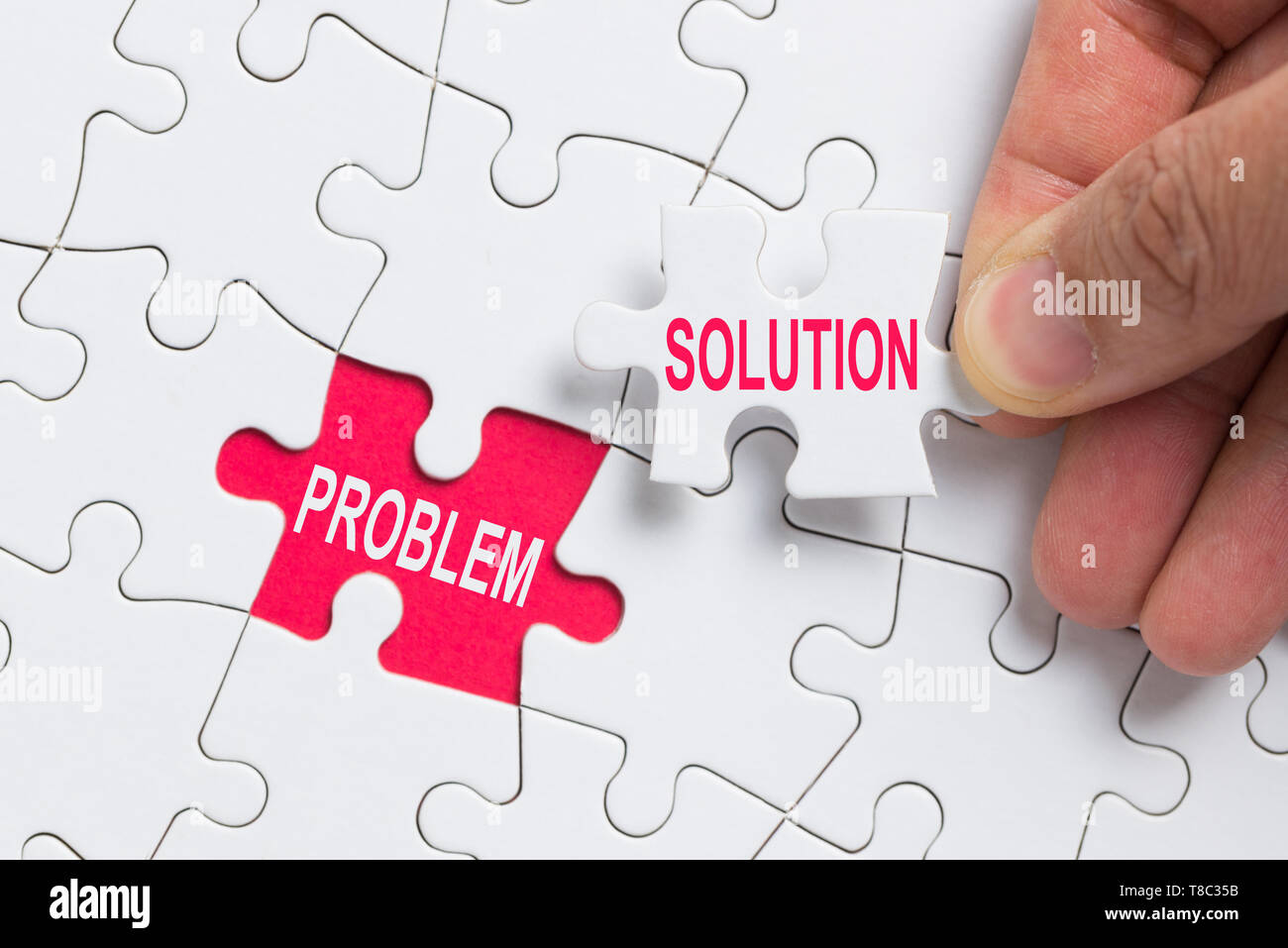 Hand stück Puzzle mit Word Problem und Lösung. Stockfoto