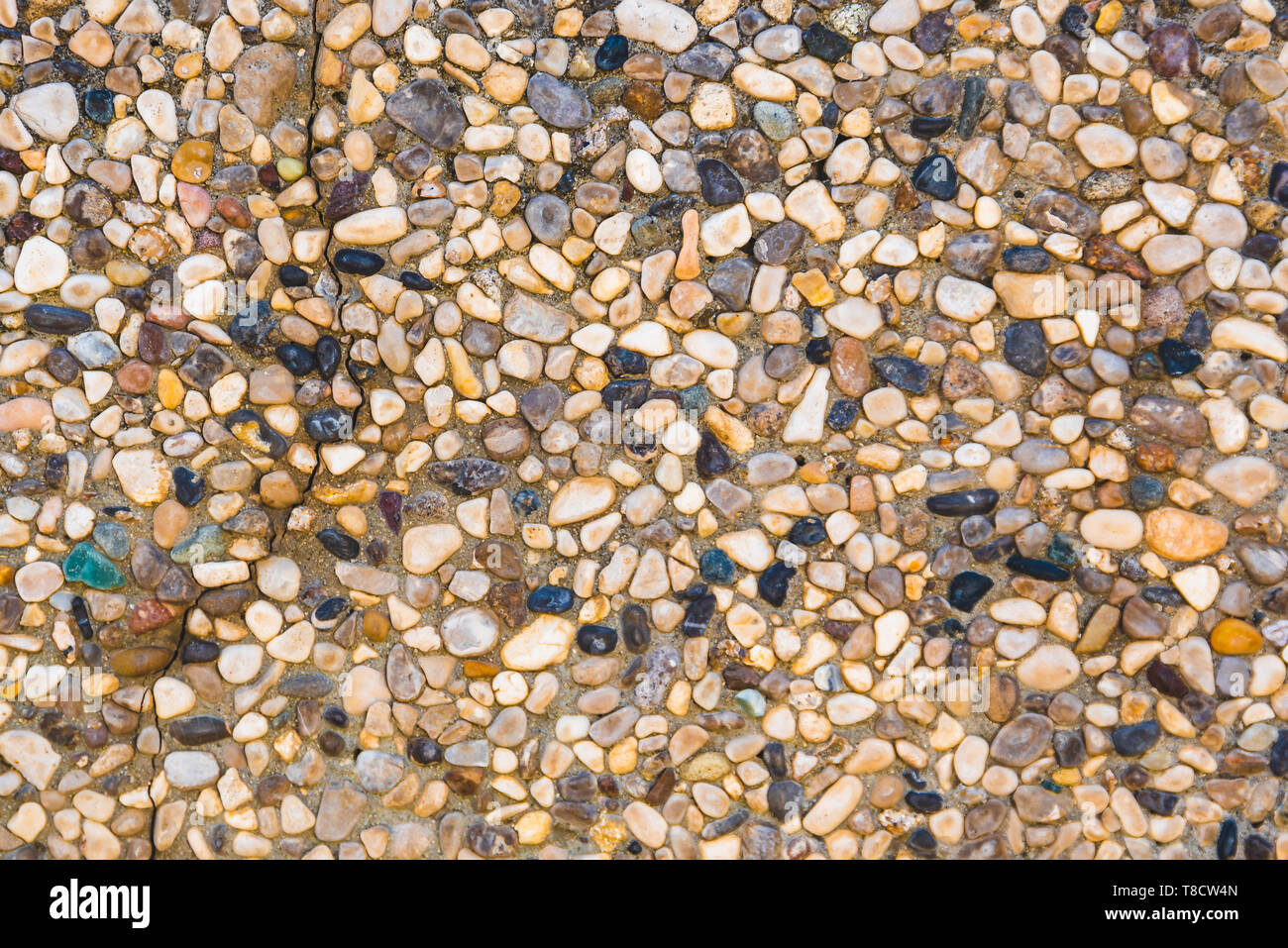 In der Nähe von Mauer aus Stein mit verschiedenen Steinen. Textur, Hintergrund Stockfoto
