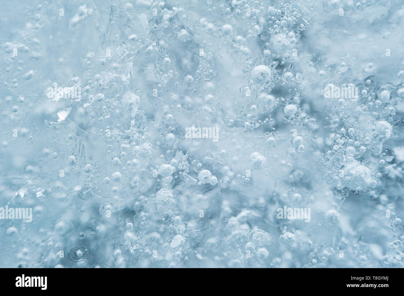Eis mit Blasen Hintergrund Textur. Erfrischend im Sommer Getränke oder arktische Kälte Konzept. Stockfoto