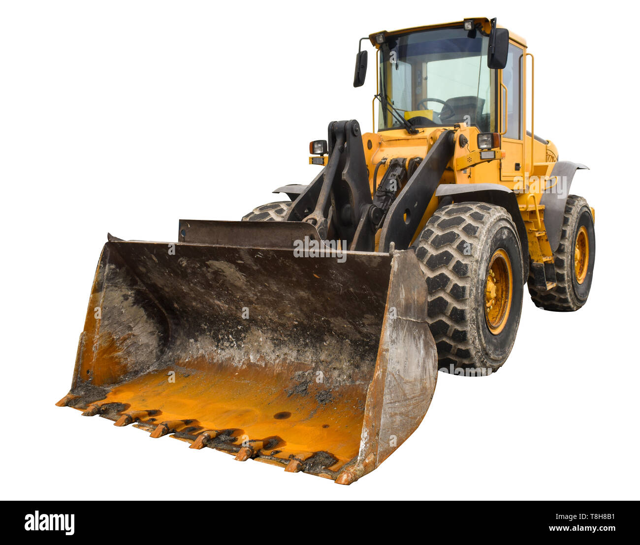 Dusty big bulldozer Lader, auf reinem weißem Hintergrund Stockfoto