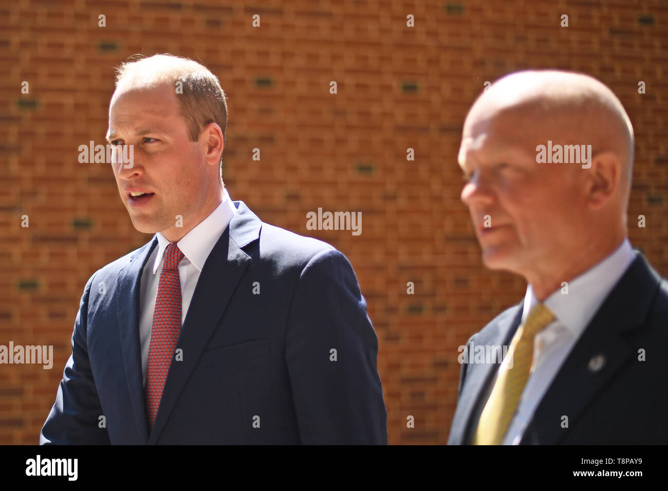 Der Herzog von Cambridge und William Hague eine United für die Tierwelt Joint Task Force Sitzung an der Royal Geographical Society in London verlassen. Stockfoto