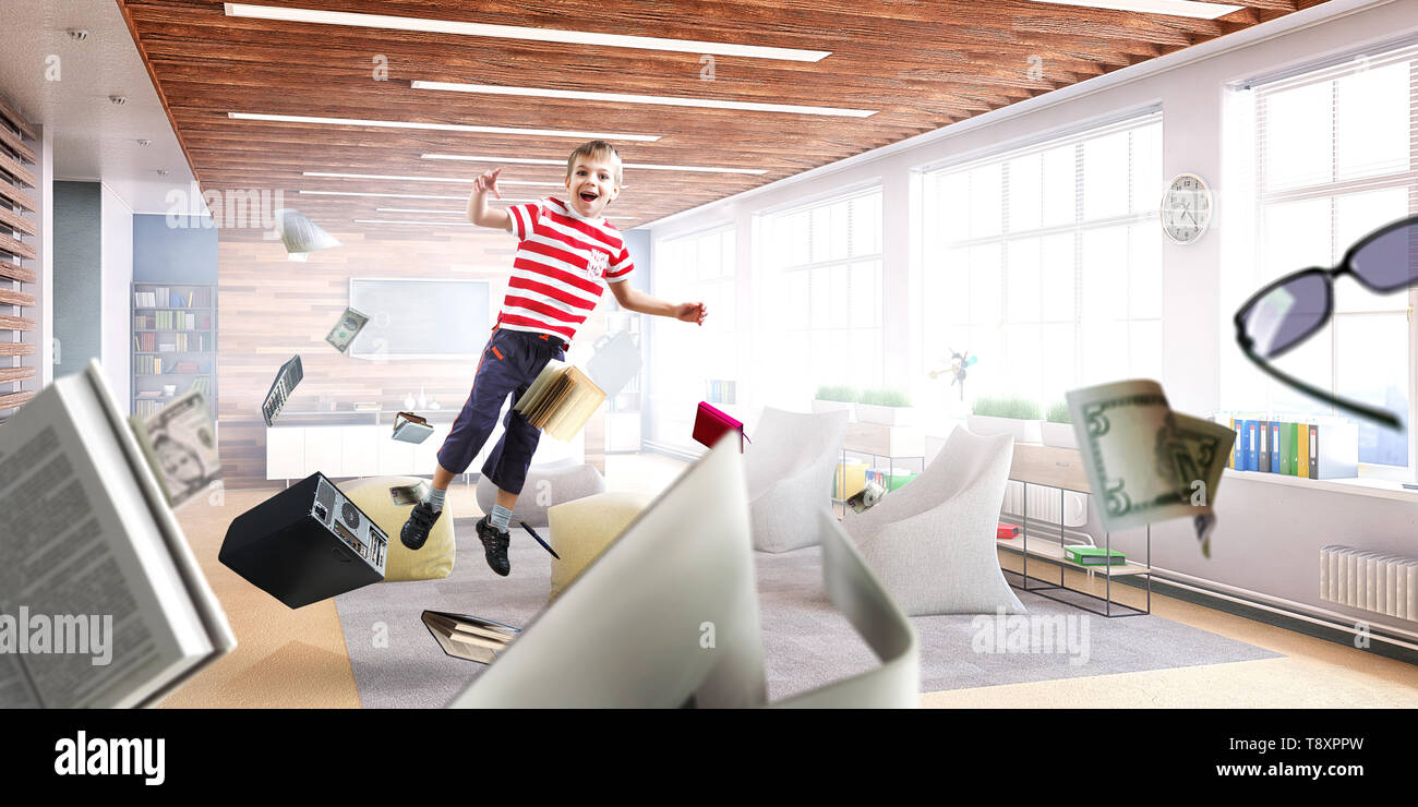 Niedliche happy little boy jumping. Mixed Media Stockfoto