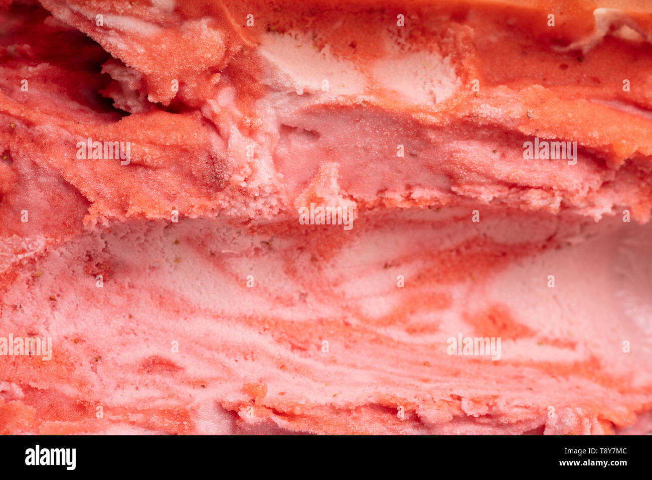 Rote Eis Textur von Erdbeereis und Erdbeersorbet gemischt Stockfoto