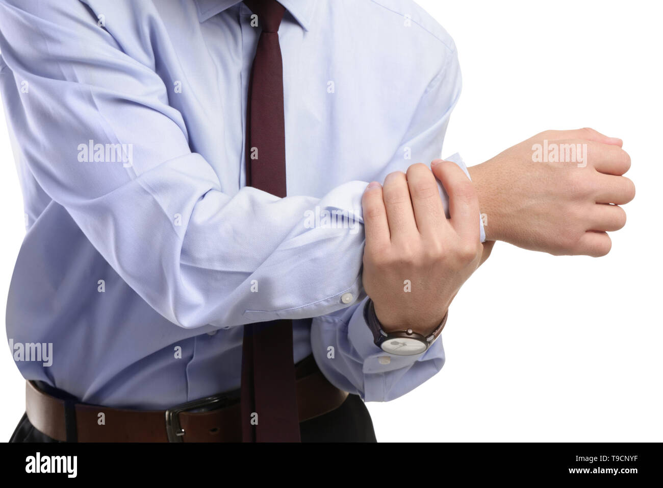 Junge Unternehmer leiden unter Schmerzen im Handgelenk auf weißem Hintergrund, Nahaufnahme Stockfoto