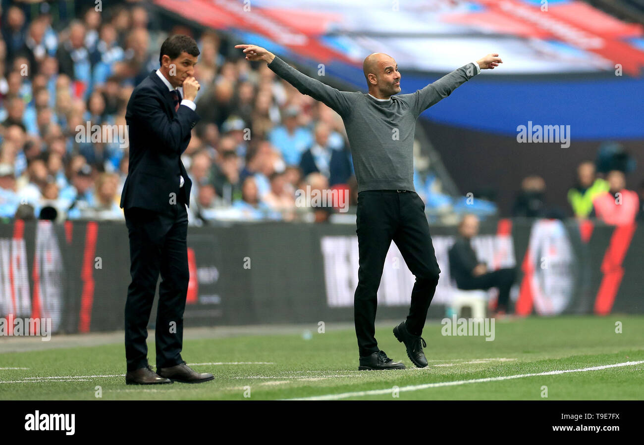Manchester City Manager Pep Guardiola Gesten auf dem touchline neben Watford manager Javi Gracia (links) Während der FA Cup Finale im Wembley Stadion, London. Stockfoto Manchester City Manager Pep Guardiola Gesten auf dem touchline neben Watford manager Javi Gracia (links) Während der FA Cup Finale im Wembley Stadion, London. Stockfoto