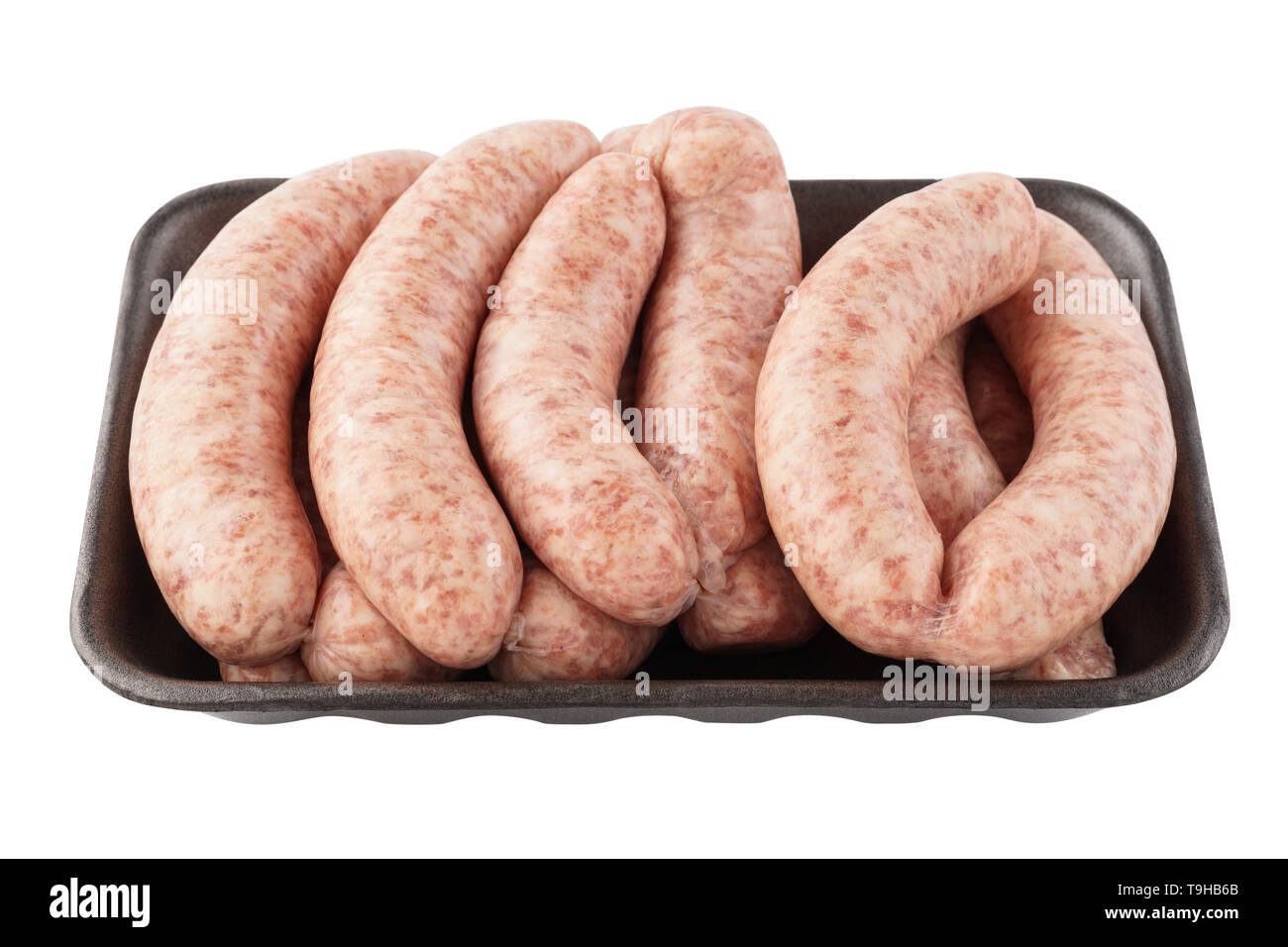Paket von rohem Rind- oder Schweinefleisch Würstchen auf weißem Hintergrund. Von der Seite. Stockfoto