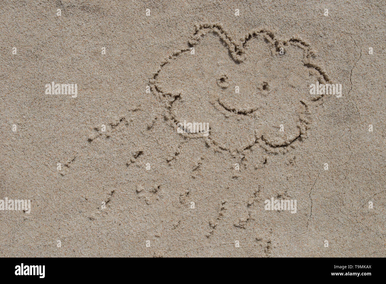 Bewoelkt und regen Zeichnung auf Sand Hintergrund Stockfoto