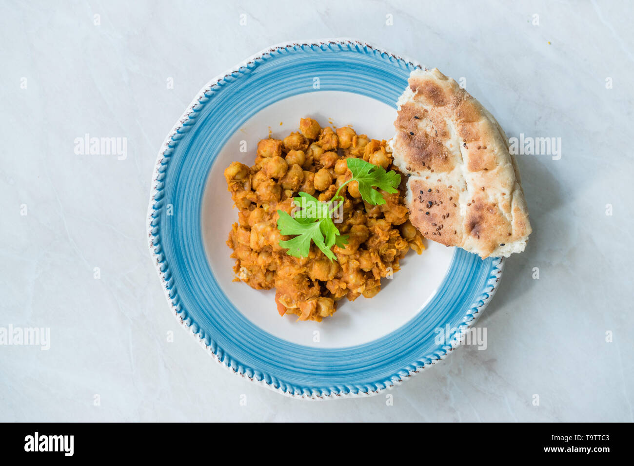 Chole oder Chana Masala oder pikant Kichererbsen ist traditionell Nordindische Hauptgericht Rezept und in der Regel mit bhature oder Roti/Naan serviert. Ökologische Lebensmittel. Stockfoto