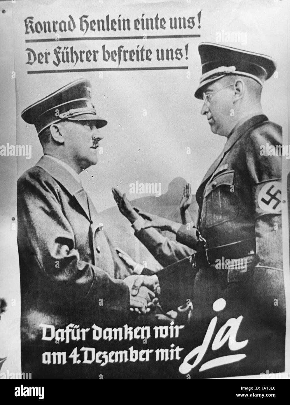 Wahlplakat für die Volksabstimmung im Sudetenland. Die Sudetendeutschen werfen ihre Abstimmung über die Annexion des Sudetenlandes an das Deutsche Reich. Auf dem Plakat: "Konrad Henlein uns vereint! Den Führer befreit uns! Wir danken ihm für das am 4. Dezember! '. Stockfoto