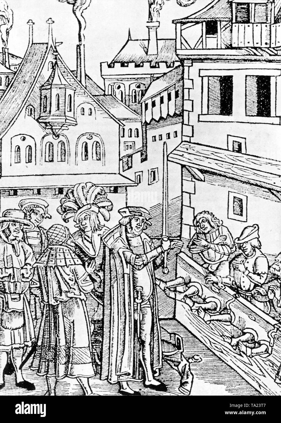 Strafe im deutschen Mittelalter: Henker mit einem Schwert bei der Ausführung von Straftätern. Stockfoto