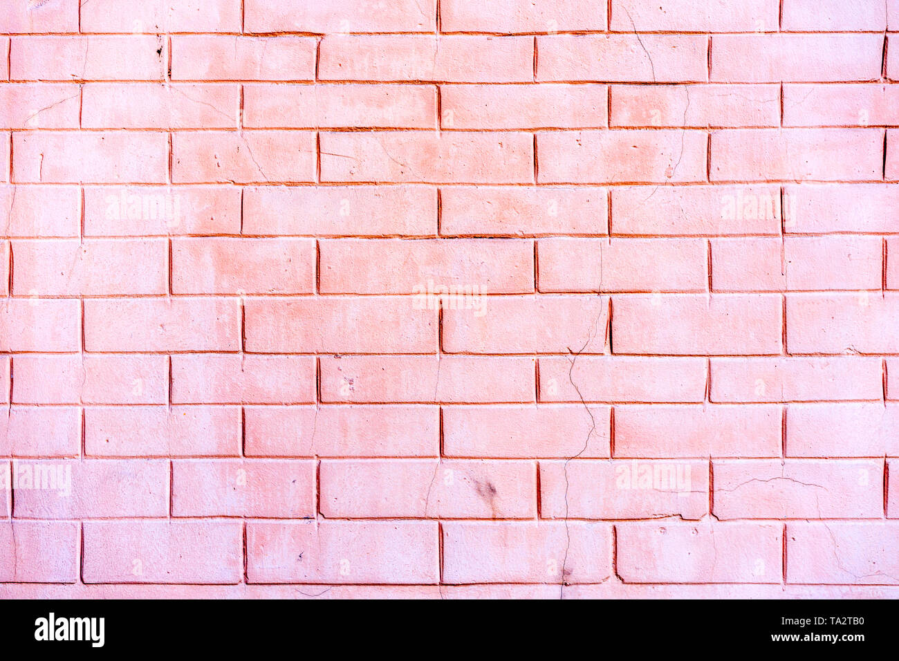 Dekorative Wand imitieren Hellrosa brick. Stockfoto