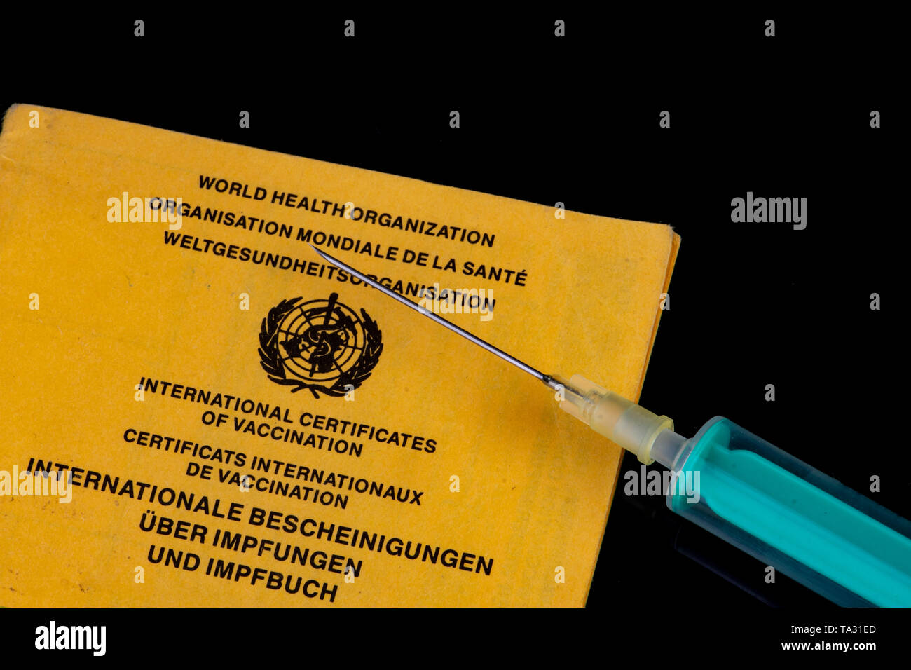 Die Impfung sollte das Erfordernis Spritze mit Nadel auf eine Impfung buchen Sie geimpft werden. Stockfoto