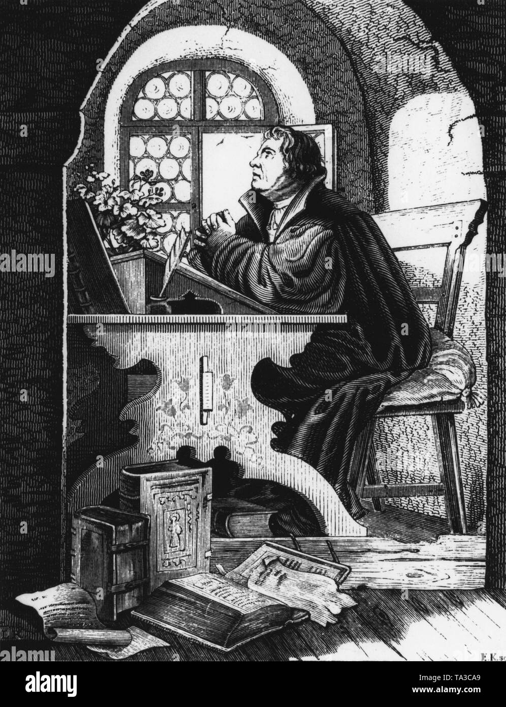 Martin Luther in seiner Bibelübersetzung auf der Wartburg. Holzschnitt aus der Mitte des 19. Jahrhunderts. Stockfoto
