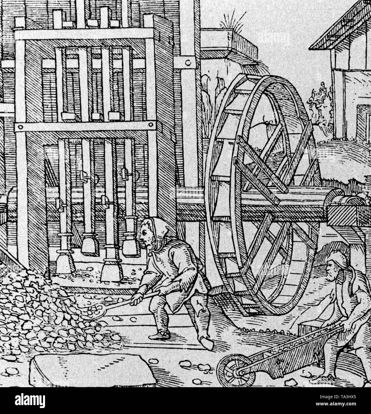 Darstellung einer so genannten Stempel Mühle für die Zerkleinerung von Eisenerz. Stockfoto