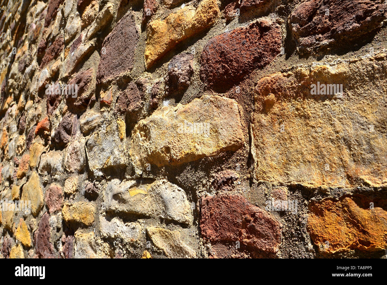 Alte historische Mauer aus Stein Stockfoto