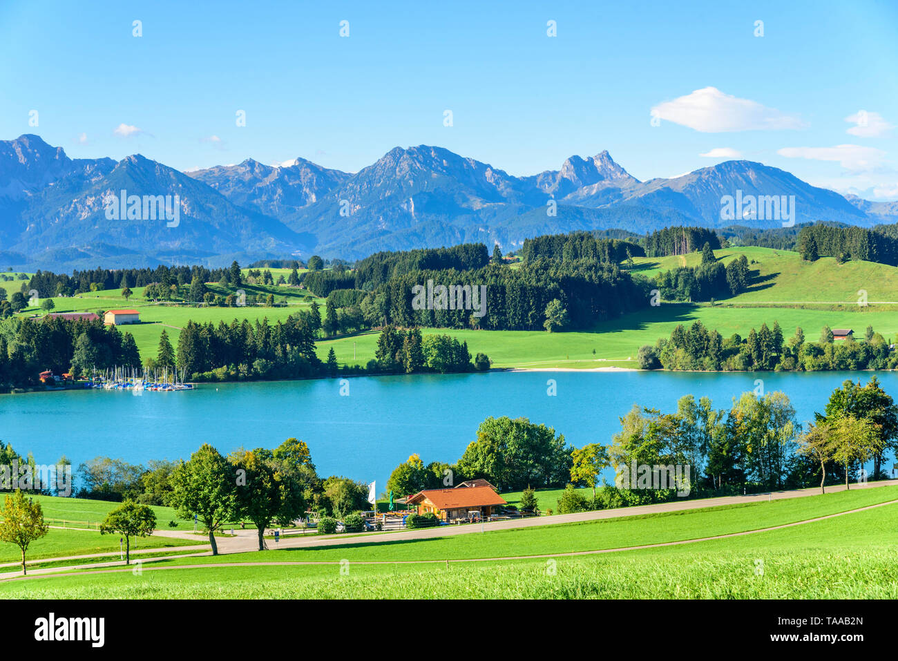 Warmen Sommermorgen im September am Forggensee bei Füssen in der bayerischen Region Königswinkel Stockfoto