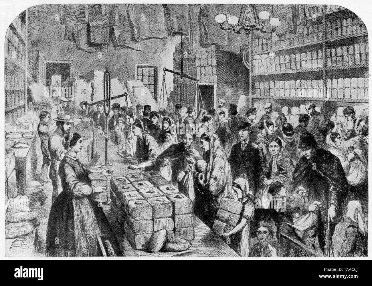 Szene während der Baumwolle Hungersnot in Lancashire', 1862. Von der Illustrated London News, 29. November 1863. Die Baumwolle Teuerung war ein Tiefstand in der Textilindustrie im Nordwesten von England, die durch die Unterbrechung der Einfuhren von Baumwollbettwäsche aus Amerika durch den Amerikanischen Bürgerkrieg verursacht. Diese Gravur zeigt eine Szene in der Manchester und Salford Provident Society, der Bereitstellung Tickets ausgestellt, um die vorherrschende Not lindern. Stockfoto