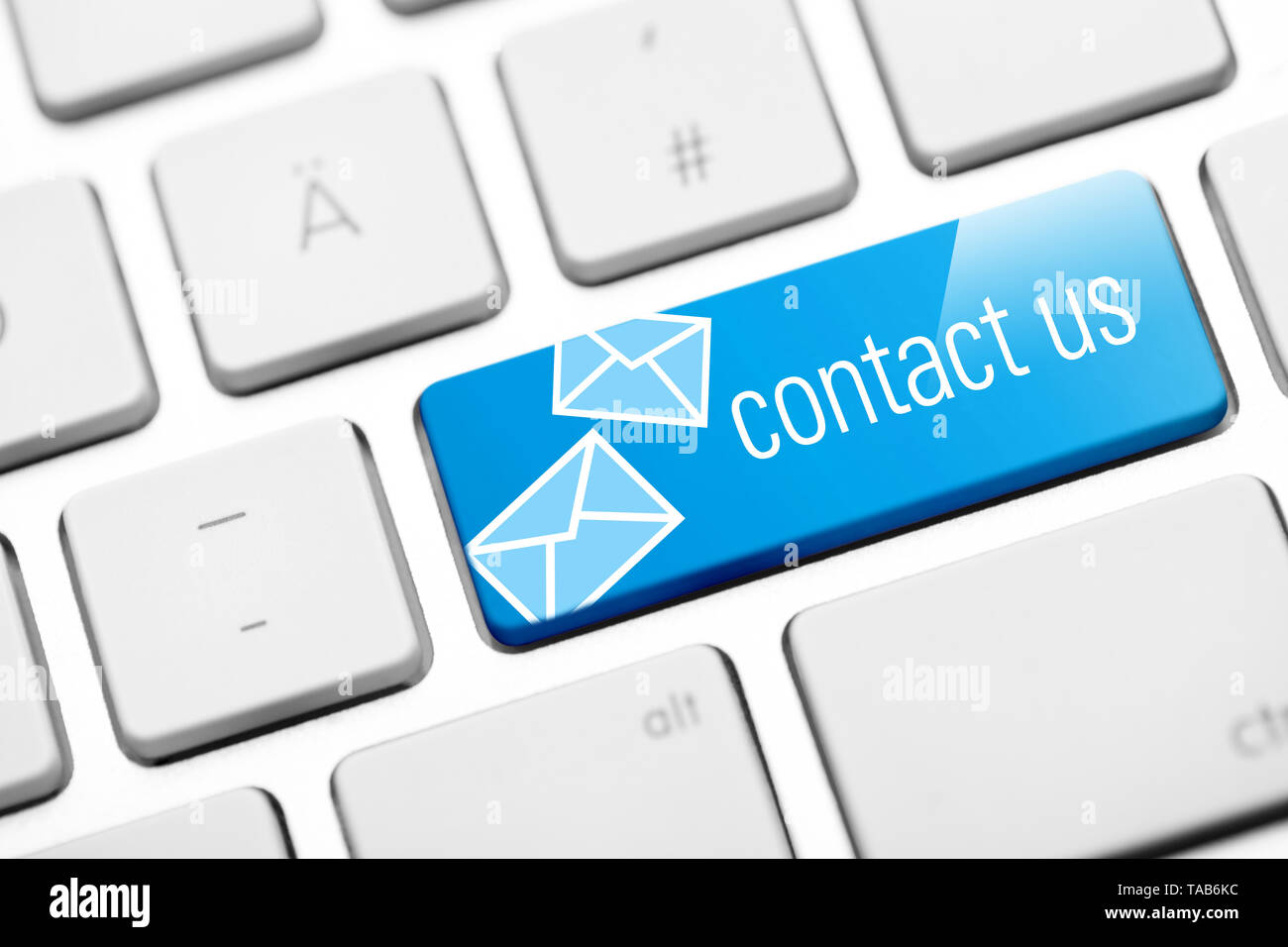 Kontakt Symbole auf weiße Tastatur Stockfoto