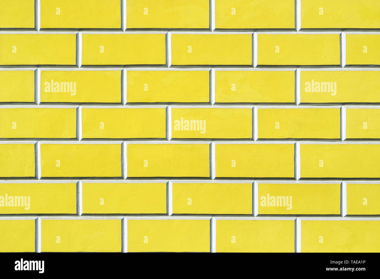 Ziegelwand Hintergrund - neue Ziegel wand Muster. Textur Mauer gelber Farbe Stockfoto