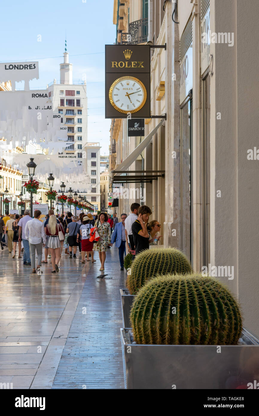 Rolex Watch Marke Zeichen mit Uhr außerhalb ein juweliergeschäft am Marques de Larios Shopping Precinct, Malaga, Andalusien, Spanien Stockfoto