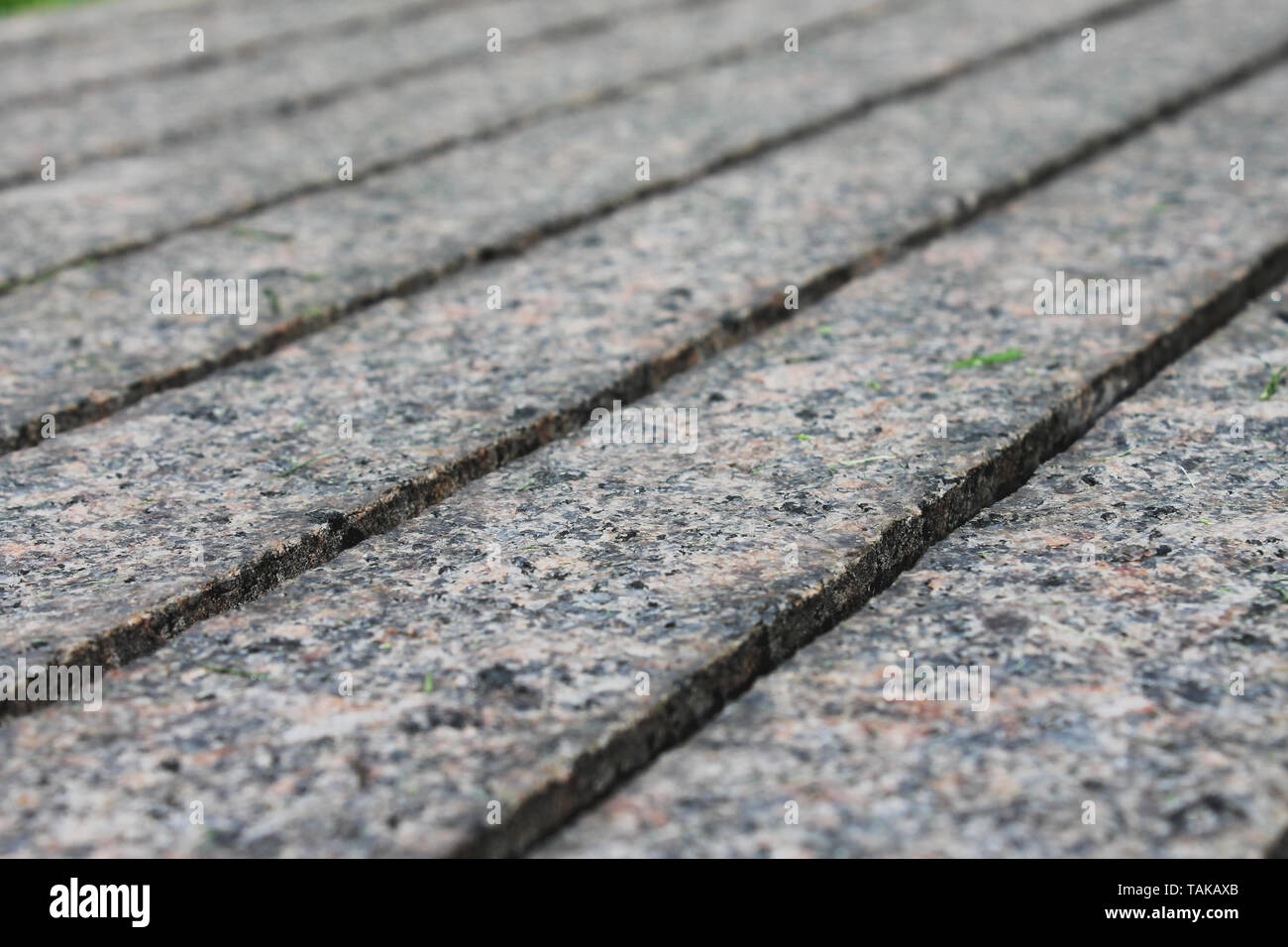 Ein Granit Sitz mit Nuten Nahaufnahme Makro Stockfoto