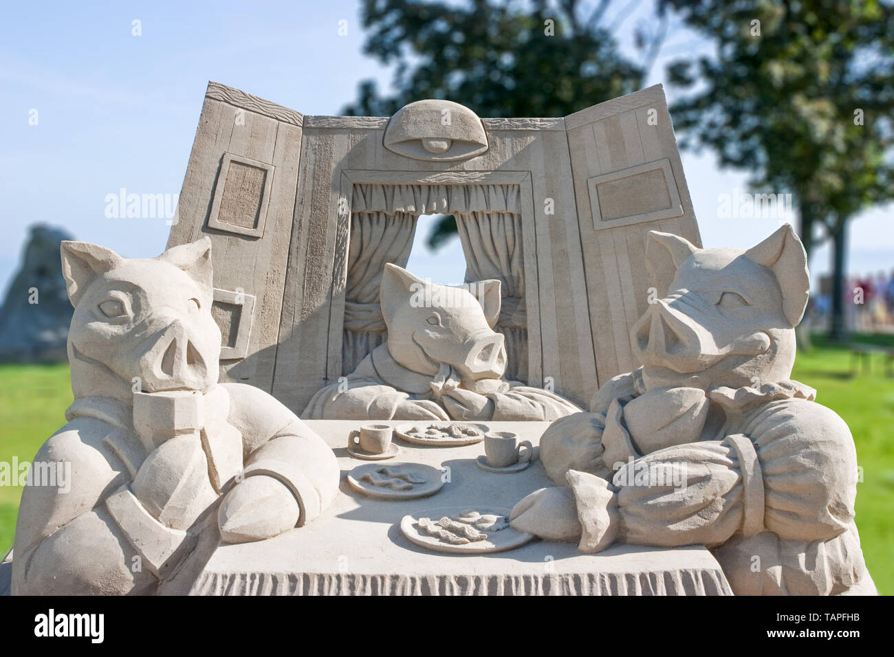 Sand Skulptur von drei Schweine Stockfoto