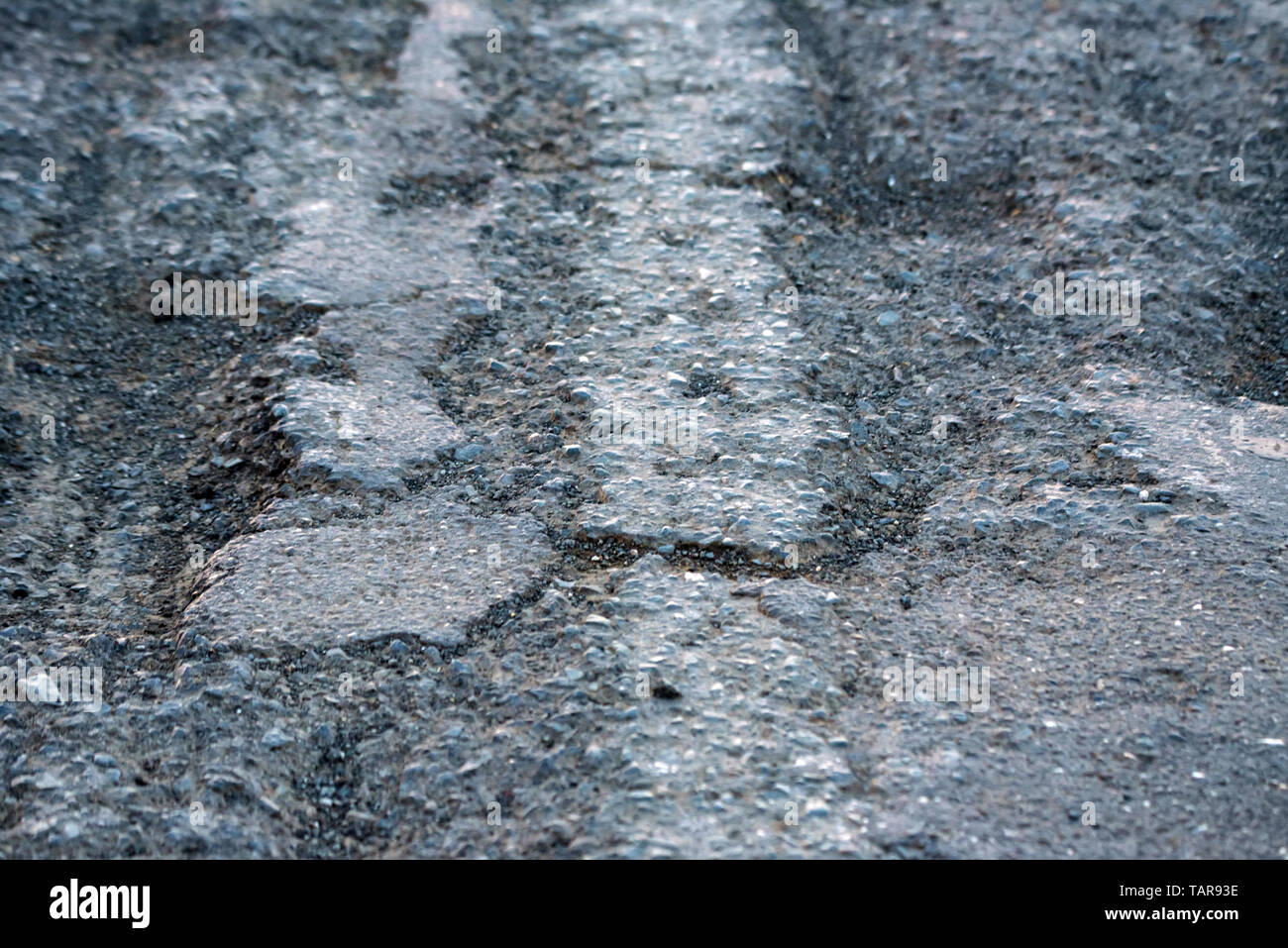Zusammenfassung Hintergrund von closeup dunklen unebener Asphalt Stockfoto