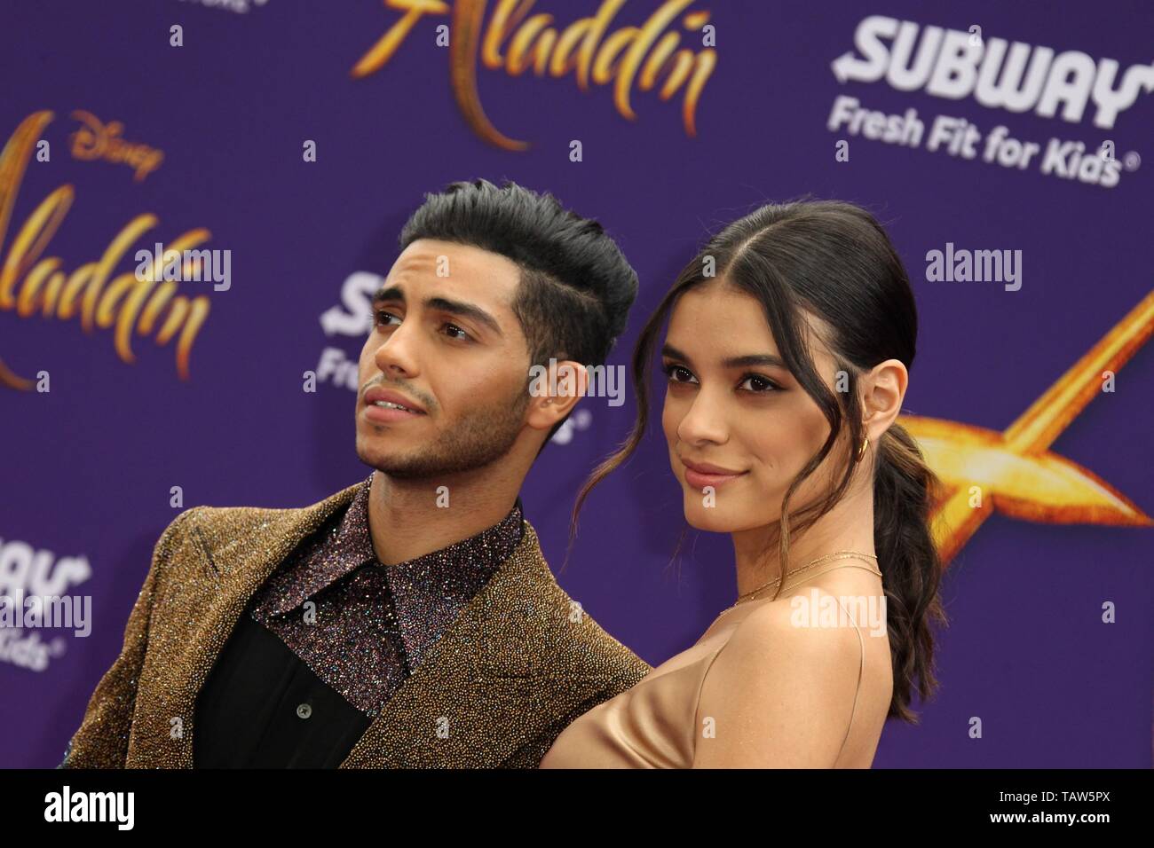 Mena Massoud, Laysla De Oliveira in der Ankunftshalle für Aladdin Premiere, El Capitan Theatre, Los Angeles, CA 21. Mai 2019. Foto von: Priscilla Grant/Everett Collection Stockfoto