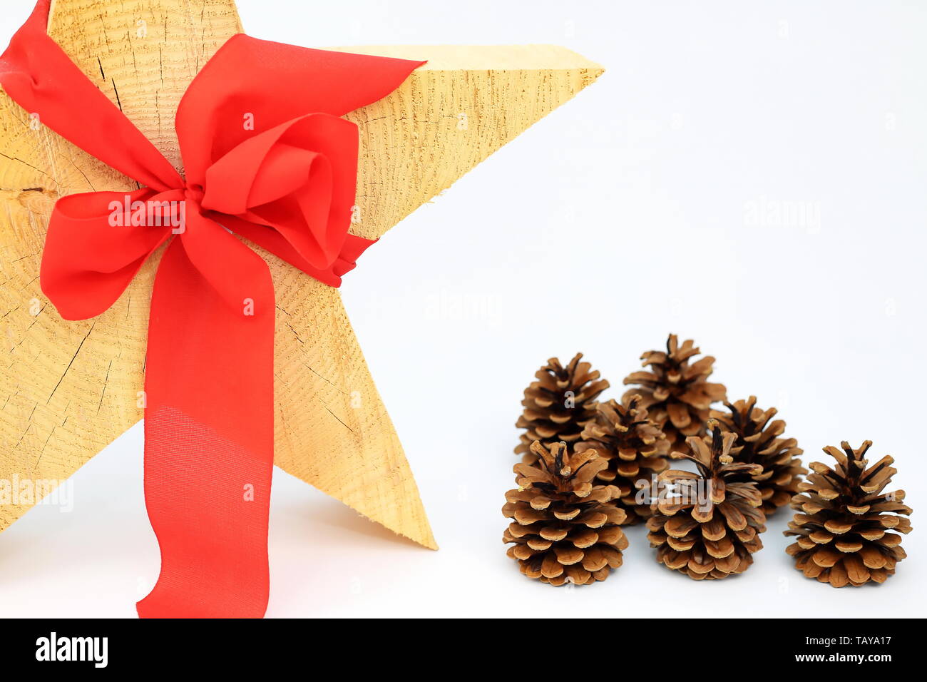 Weihnachten stern dekoration mit roter Schleife Stockfoto