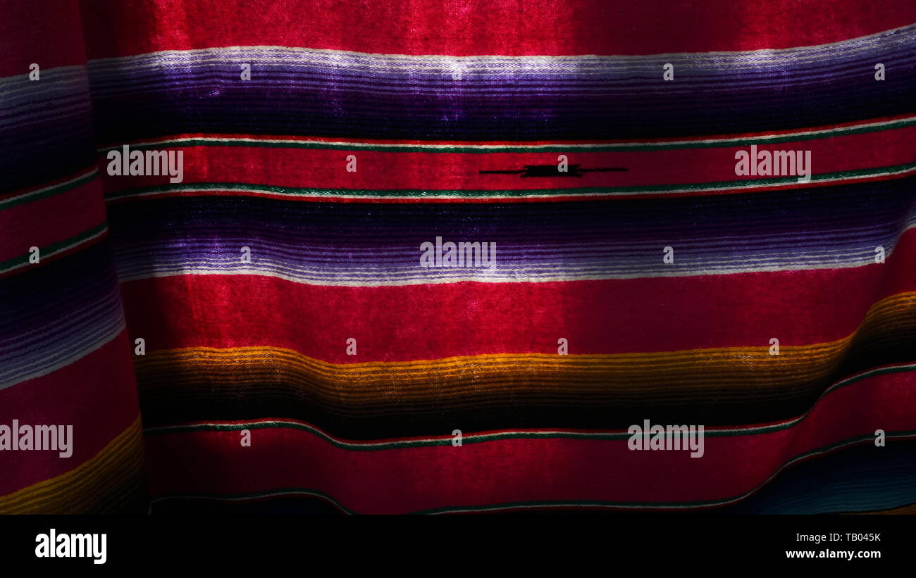 Farbenfrohe Mexikanische gestreifte serape Decke oder textile Muster Hintergrund. Stockfoto