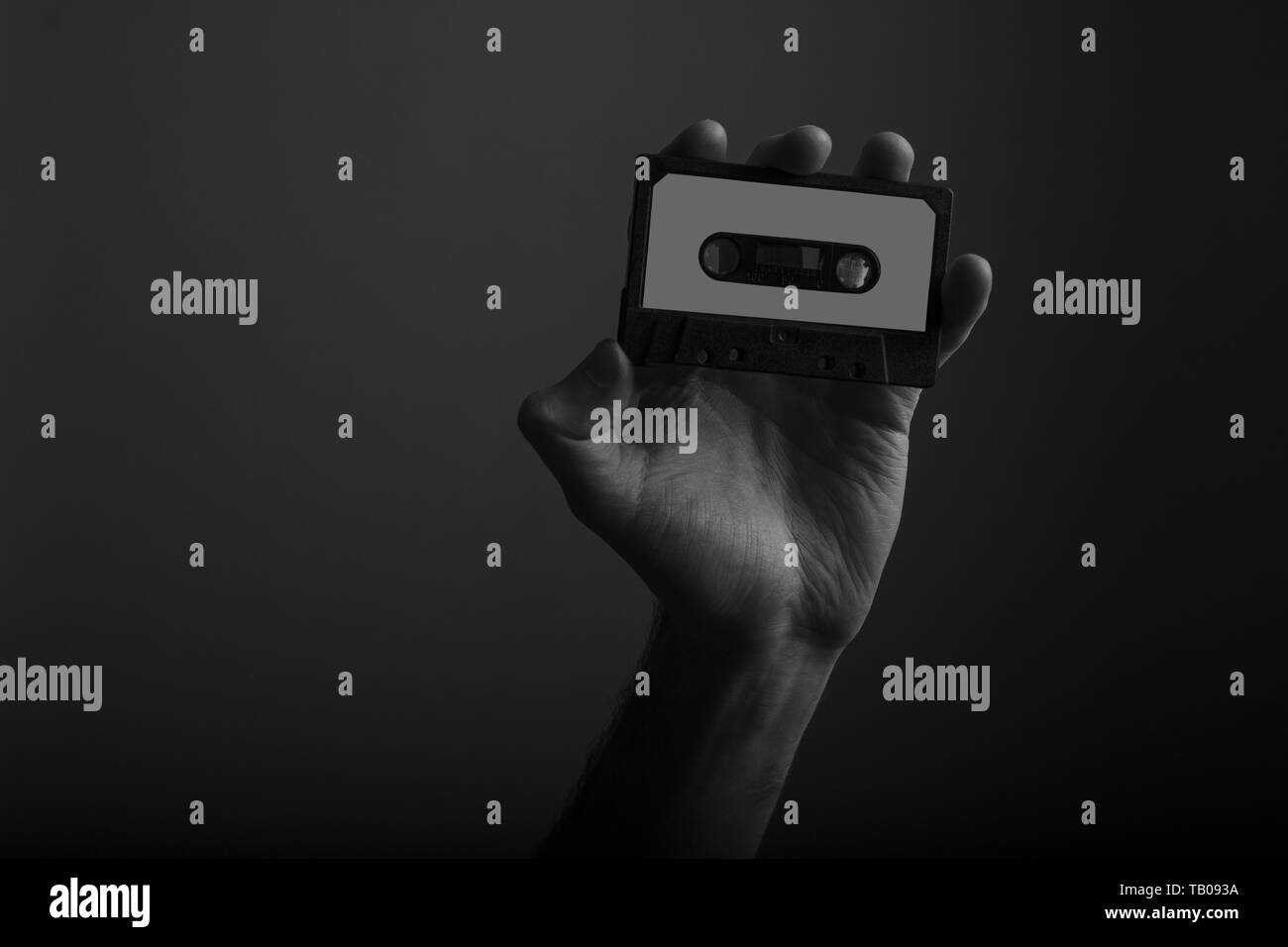 Männliche hand Vintage Retro Musik Kassette Stockfoto