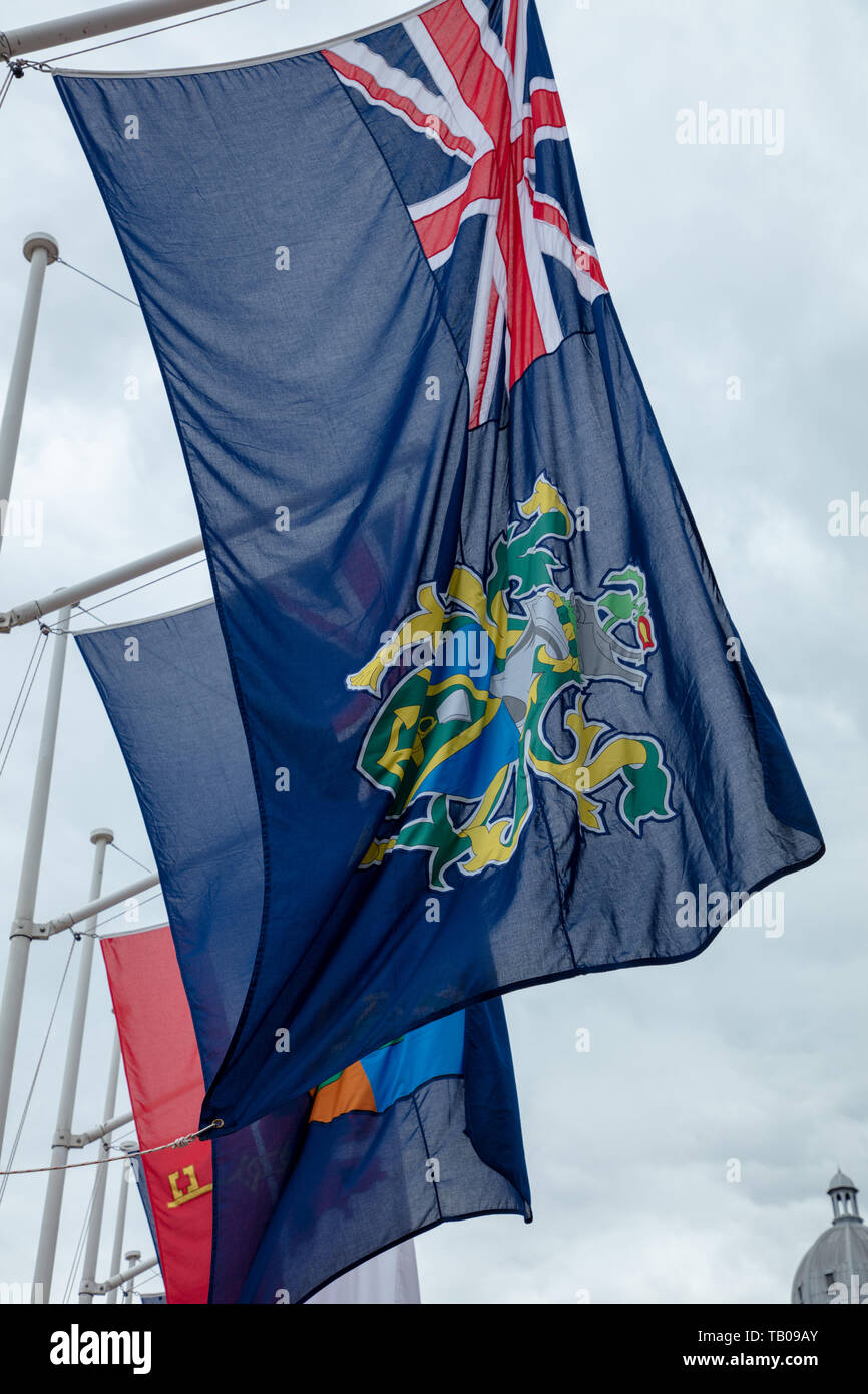 Flagge Pitcairn Inseln fliegen in den Wind, Parliament Square, London, UK feiern Crown Dependencies und überseeischen Gebiete. Stockfoto