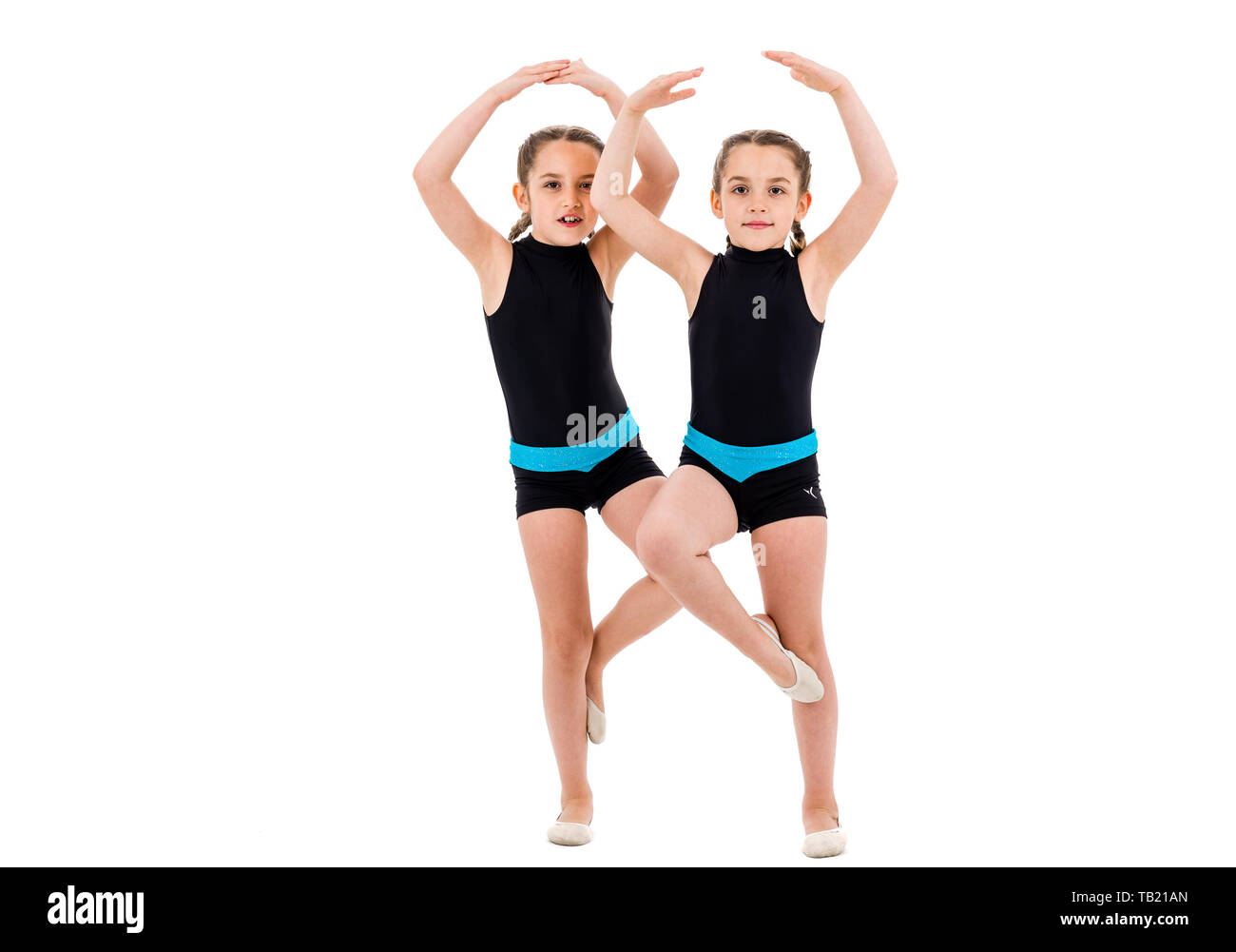Wörter Die Mit Tanzen Zu Tun Haben Little girl gymnast doing exercise Ausgeschnittene Stockfotos und