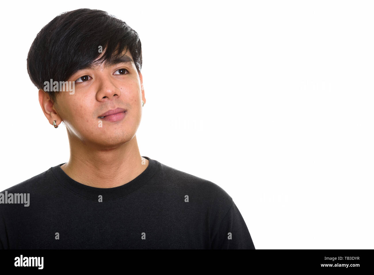 Studio shot cool aussehenden asiatischer Mann denken Stockfoto