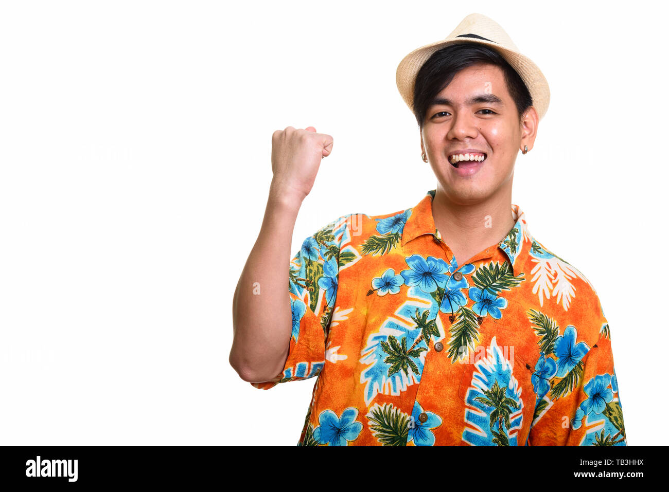 Junge glücklich asiatischer Mann lächelnd und suchen motivierte Stockfoto