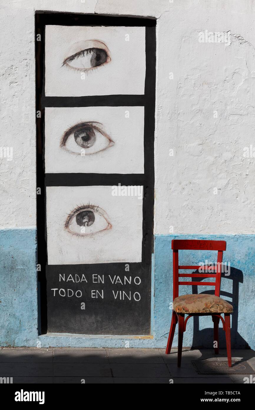 Single Augen in verschiedene Richtungen, Graffiti mit einem Motto, vor einer Weinbar, Bezirk El Cabanyal, Valencia, Spanien Stockfoto