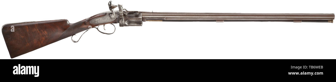 Ein Flintlock revolver Gewehr, Collier System, London, ca. 1820/25, gebläute Damaskus aus Stahl mit oberen und unteren Rippe, 8-Nut rifled Bohrung 14 mm Kaliber. Silberne front Sight, aufeinander abgestimmten Kimme. Die Außenseite der Laufbuchse stark abgenutzt, mit neuer Flächen, die mittelrippe im mittleren Abschnitt etwas durch Reinigung getragen. Auf dem Fass Rippe die erneuerte Gravur" E.H. Collier 129 London'. 5-shot Zylinder, Ladewagen, frizzen mit Grundierung Puder Behälter. Jahrhundert - Additional-Rights Clearance-Info - Not-Available Stockfoto
