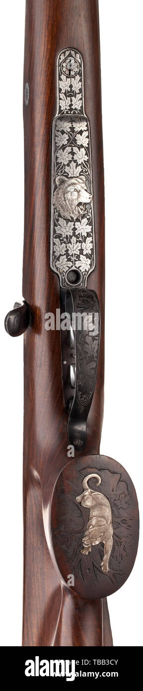 Ein wiederkehrendes Gewehr Hensel, Rothenburg o.d. Tauber Kal. .300 Win. Mag, nein. 1469.577. Österreichische Bestätigung markieren. Helle Bohrung, Länge 65 cm. Achteckige barrel von Böhler spezielle Zylinder Stahl. Mauser 98 System mit Schraube läuft in der Nähe der Waffe. Deutsche Haar auslösen. Zusätzliche Folie Sicherheit auf Lager Handgelenk. Aktion bei maple leaf Gravur. Magazin gut Abdeckung mit Ahorn Blätter und auf ihnen gravierte tragen den Kopf in Silber Inlay. Daumenloch bestand aus gemasertem Wurzelholz. Auf Pistolengriff Ende Silber inlay Holz Intarsien von springenden Puma. Unterarm, Additional-Rights - Clearance-Info - Not-Available Stockfoto