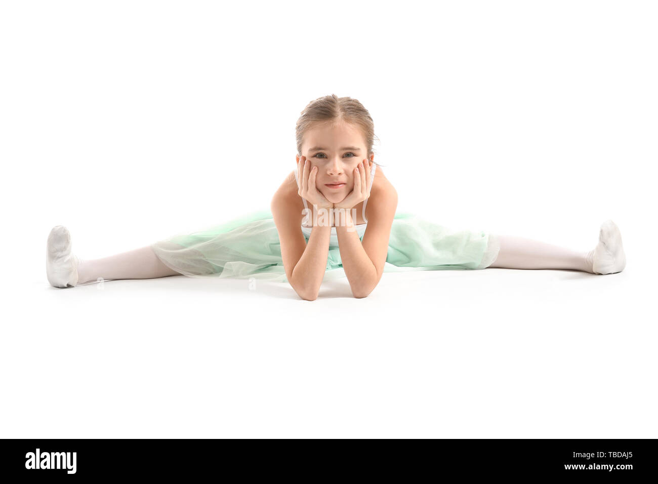 Süße kleine Ballerina auf weißem Hintergrund Stockfoto