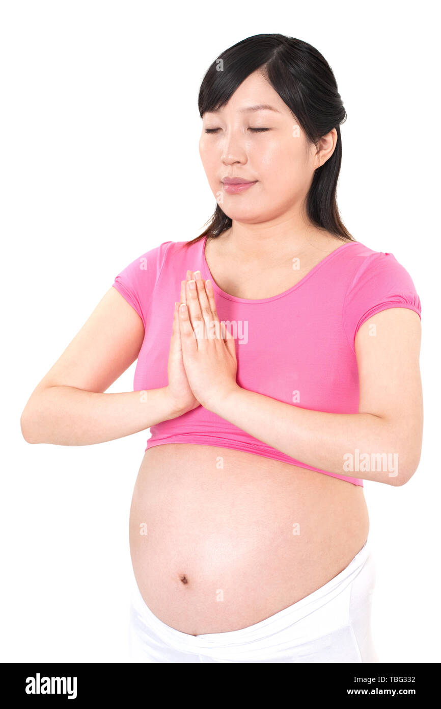 Eine schwangere Frau funktioniert. Stockfoto