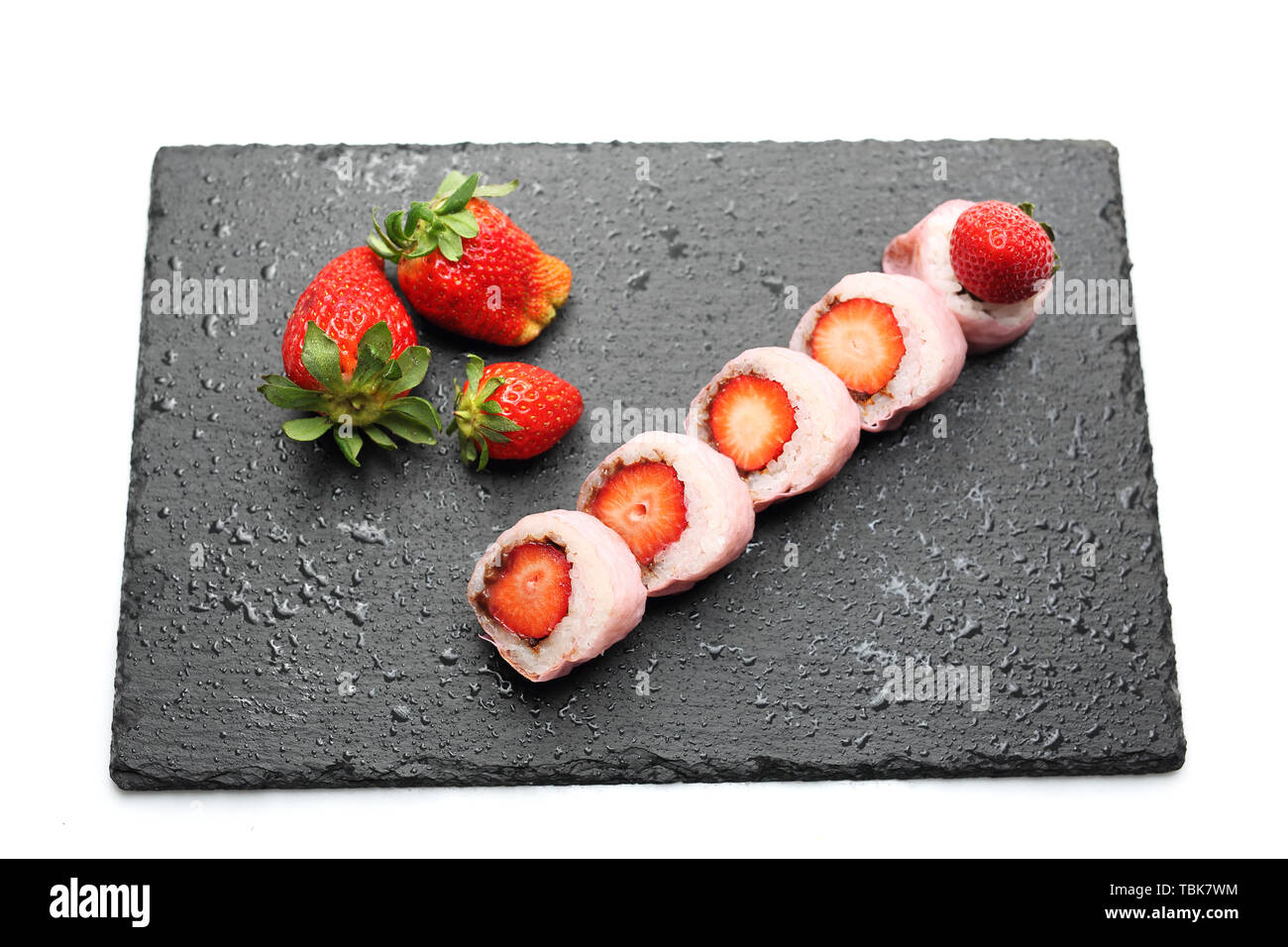 Leckere süße Sushi, Obst und Dessert. Horizontale Zusammensetzung Stockfoto