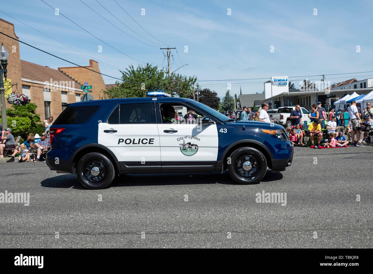 Lynden Polizei Auto führt für die Lynden Landwirte Day Parade. Lynden, Washington Stockfoto