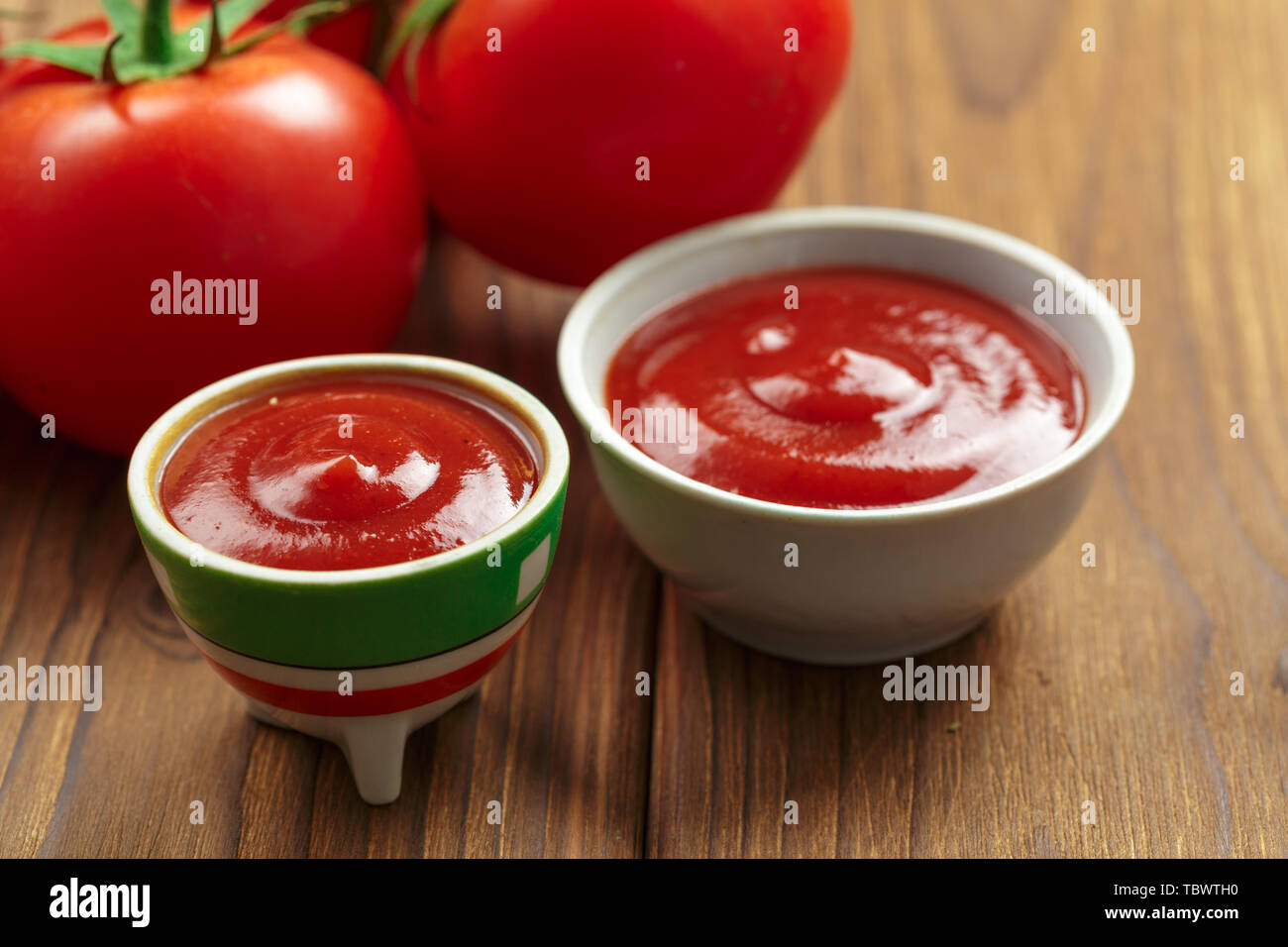 Tomatenmark und Tomat Stockfoto