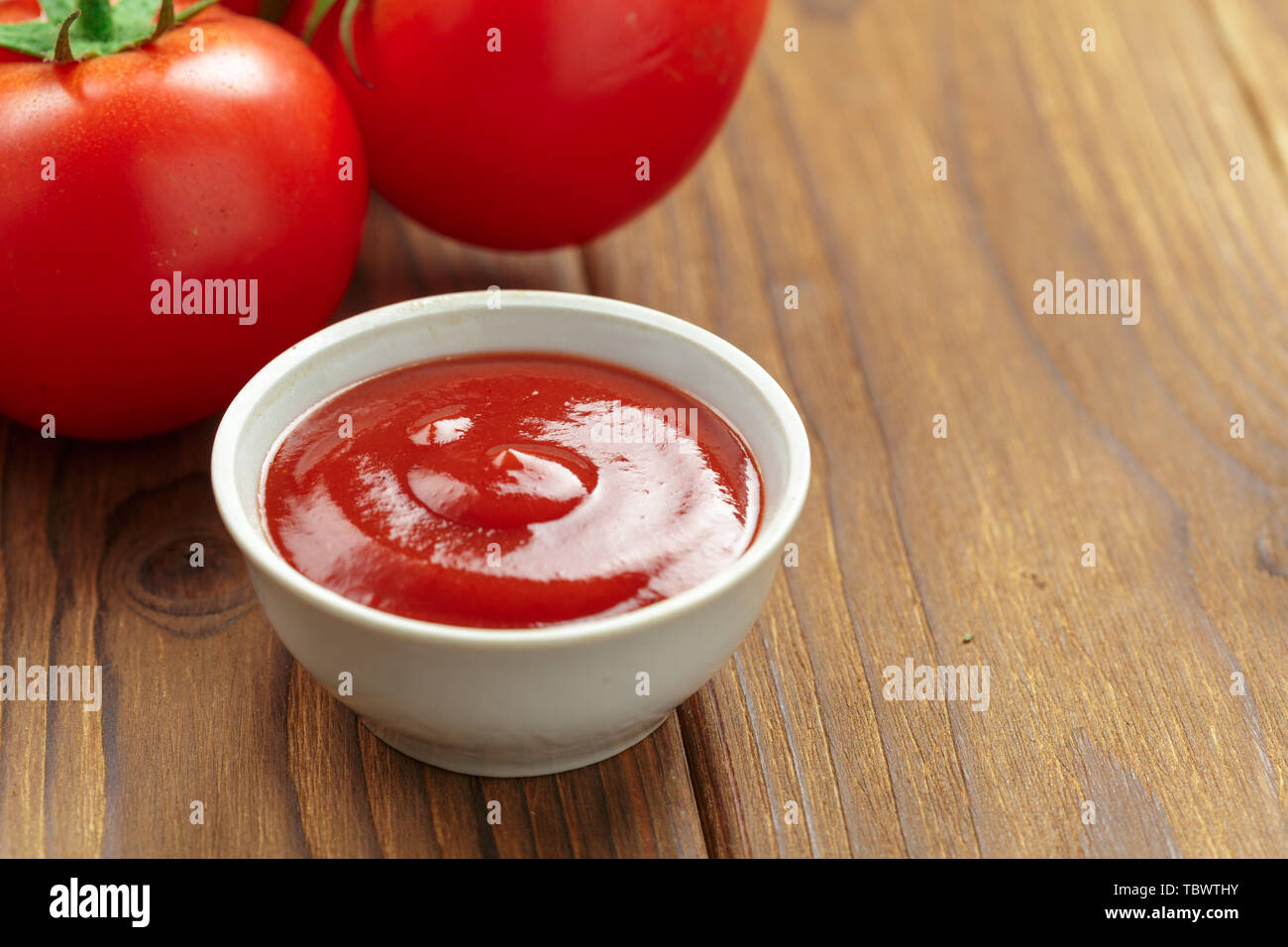 Tomatenmark und Tomat Stockfoto
