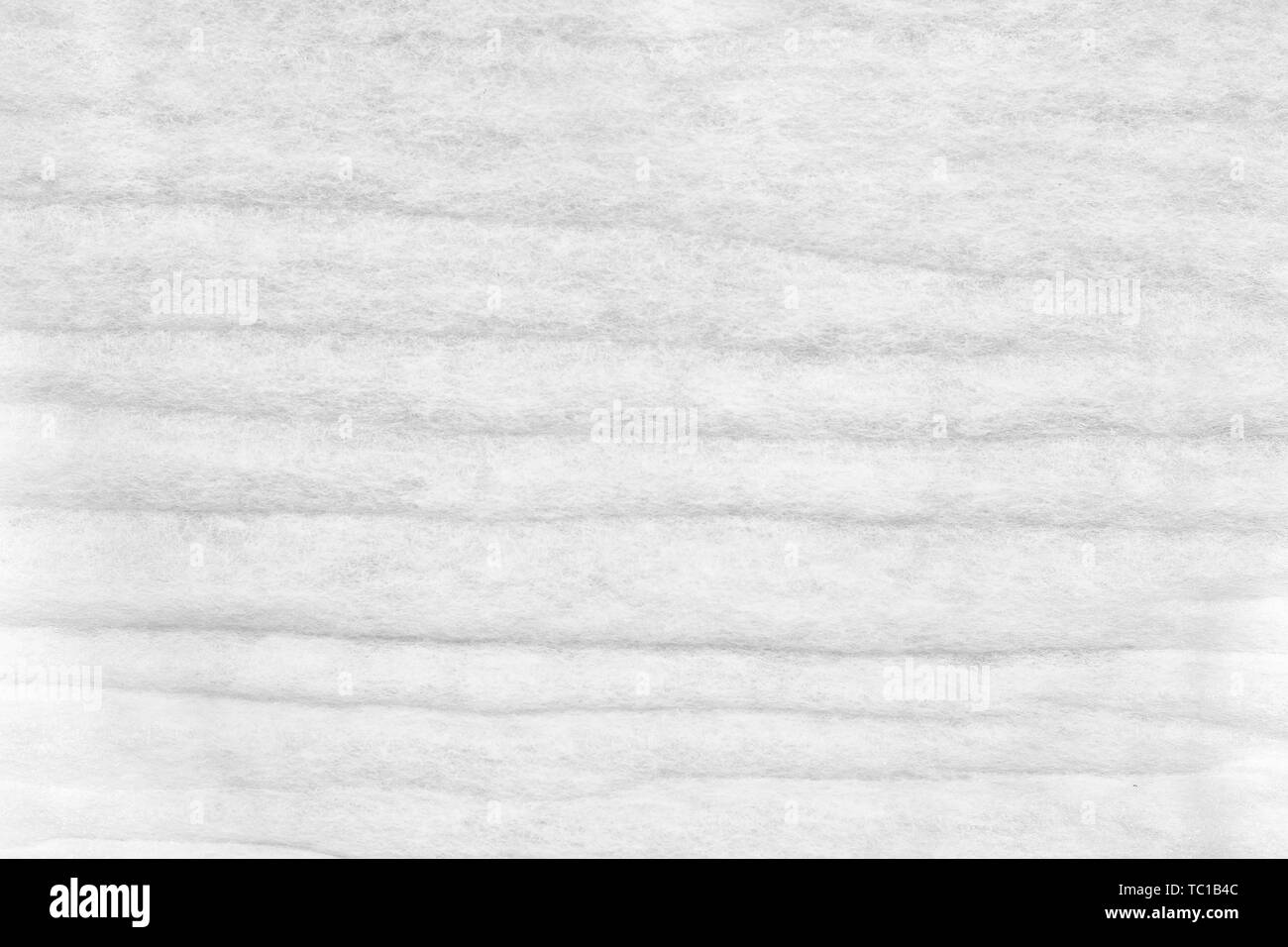 Weiße synthetische Faser Bett Matratzenauflage Textur Nahaufnahme Stockfoto