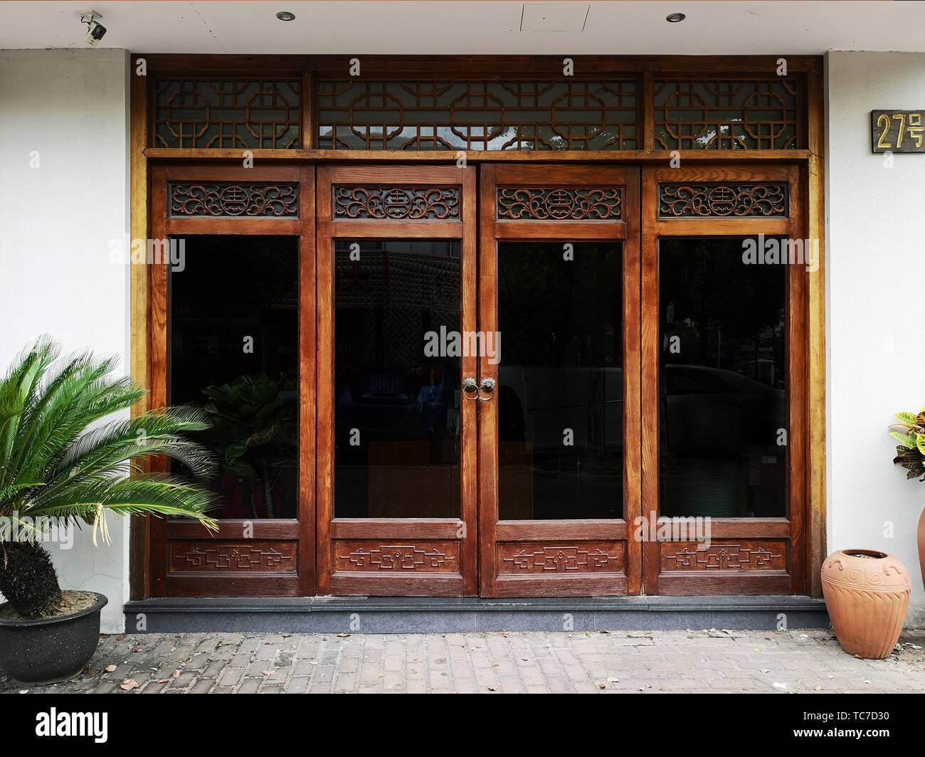 Chinesische shop Glas Holztür Stockfoto
