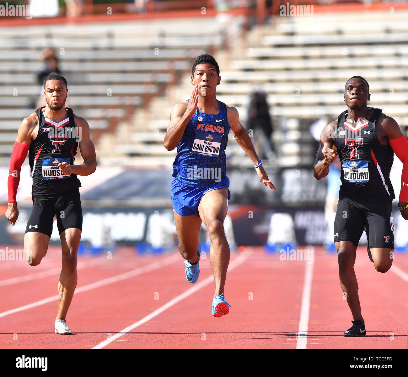 (L-R) von Texas Tech Andrew Hudson, Florida's Abdul Hakim Sani Braun, und der Texas Tech göttlichen Oduduru konkurrieren in der Männer 100 m Halbfinale - Wärme 3 während der 2019 NCAA Division I Outdoor Leichtathletik Meisterschaften an Mike A. Myers Stadion in Austin, Texas, USA, 5. Juni 2019. Quelle: LBA/Alamy leben Nachrichten Stockfoto