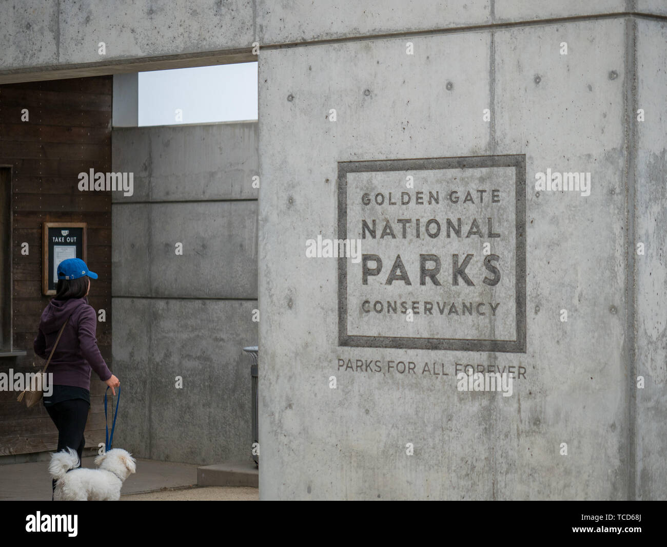 Golden Gate National Parks Wintergarten logo mit Frau wandern dogv Stockfoto