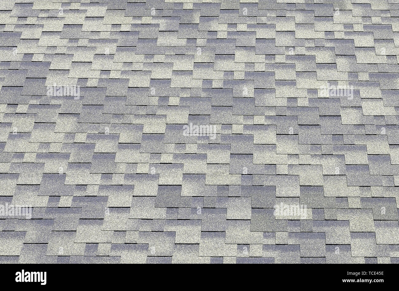 Flexible Schindeln von Bitumen Oberfläche. Hintergrund Mosaik Textur von  Flachdach Fliesen mit bituminösen Beschichtung Stockfotografie - Alamy