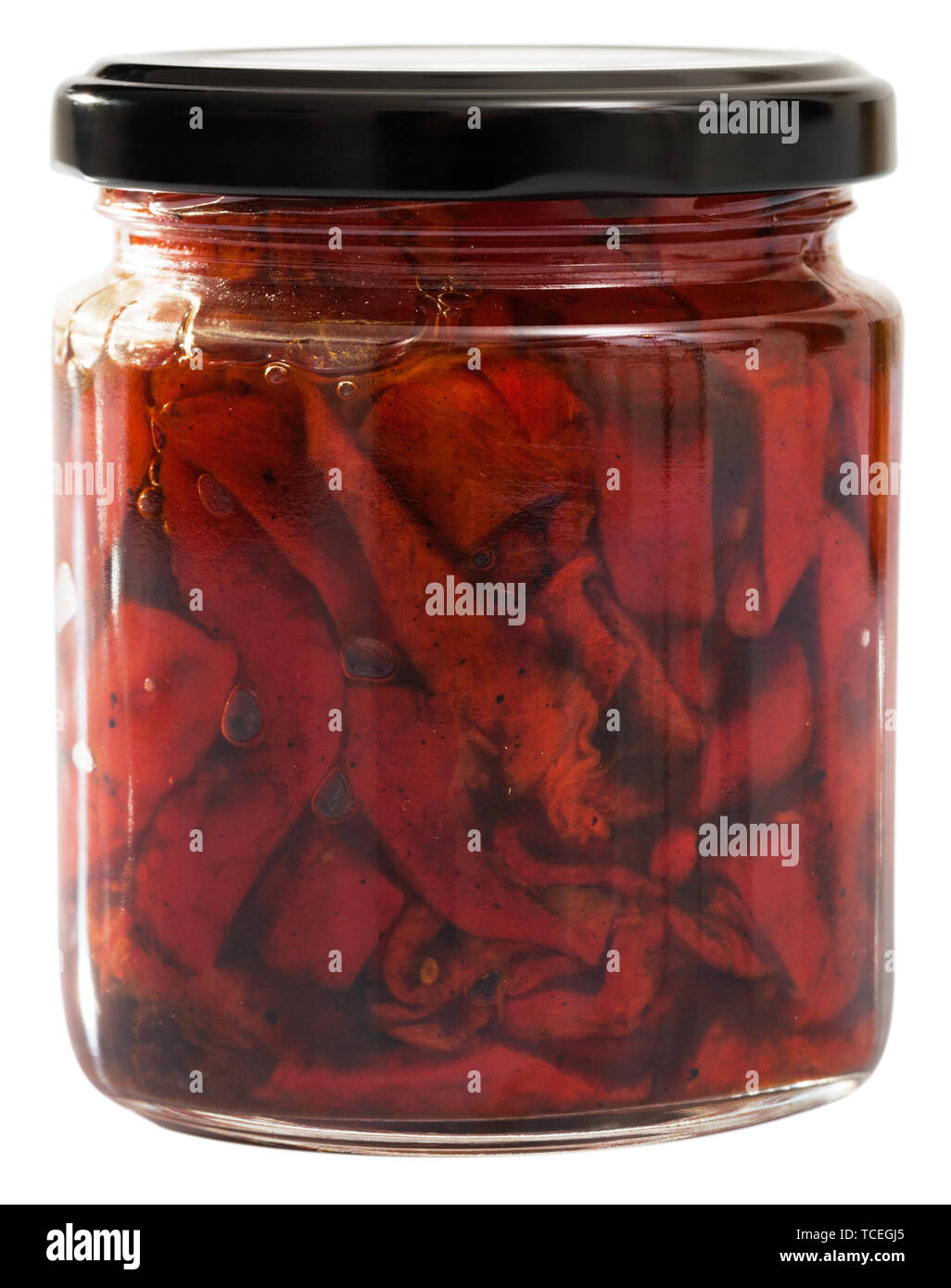 Konserven geröstet geschnitten Paprika in Glas. Auf weissem Hintergrund Stockfoto